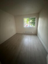 15415 35th Ave W, Unit e201 in Lynnwood, WA - Foto de edificio - Building Photo