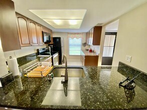 145 Cypress Way E in Naples, FL - Building Photo - Building Photo