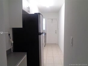 1451 NE 170th St, Unit 104A in North Miami Beach, FL - Building Photo - Building Photo