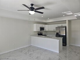 397 Carrillon Ave S in Lehigh Acres, FL - Building Photo