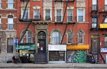 114-116 E First St in New York, NY - Building Photo - Building Photo