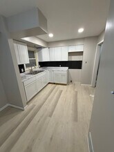 3102 Trumbull Ave in Flint, MI - Foto de edificio - Building Photo