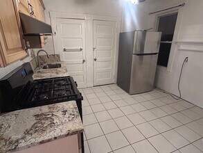 97 Franklin St, Unit 1 in Boston, MA - Building Photo - Building Photo