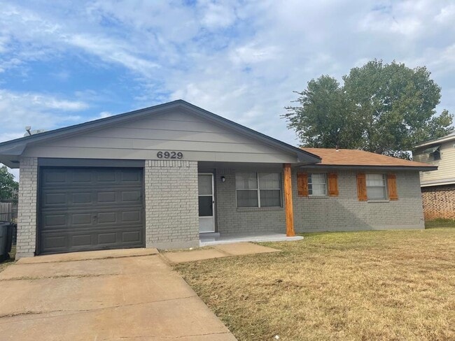 property at 6929 SW Delta Ave