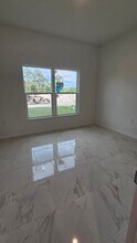 54 Xelda Ave S in Lehigh Acres, FL - Building Photo - Building Photo