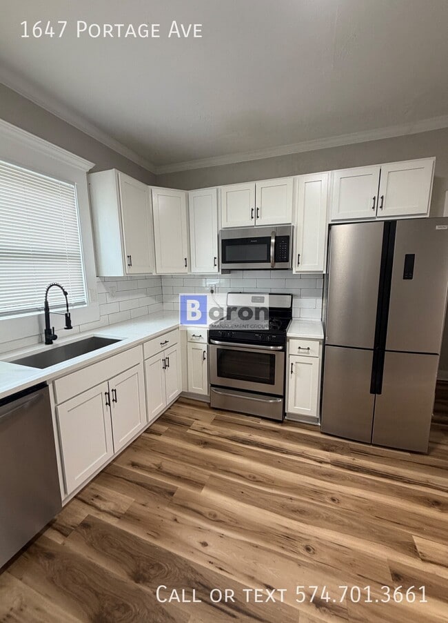 property at 1647 Portage Ave