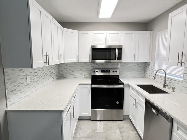 4696 Collier Rd in Greenacres, FL - Building Photo - Building Photo
