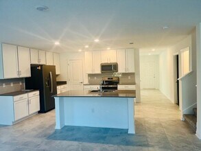 1910 Birnham Wood Bnd in Kissimmee, FL - Building Photo - Building Photo