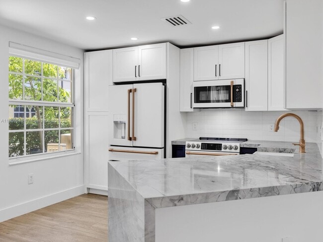 property at 8930 NE 8th Ave