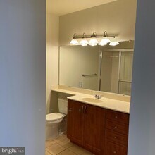 12957 Centre Park Cir-Unit -204 in Herndon, VA - Building Photo - Building Photo
