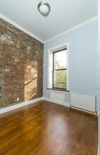 34 E 1st St in New York, NY - Building Photo - Building Photo