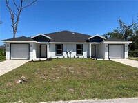 9398 Agate St in Port Charlotte, FL - Foto de edificio - Building Photo