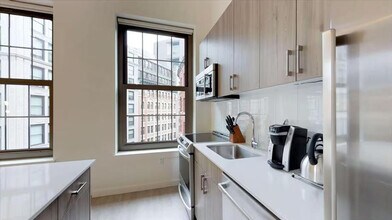 8 Harrison Ave, Unit SI ID1040147P in Boston, MA - Foto de edificio - Building Photo