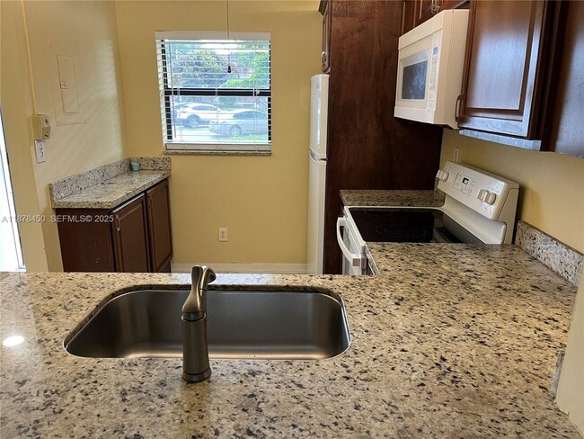 property at 10401 NW 11th St