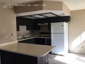 1209 N Buffalo Dr-Unit -Unit 102 in Las Vegas, NV - Building Photo - Building Photo