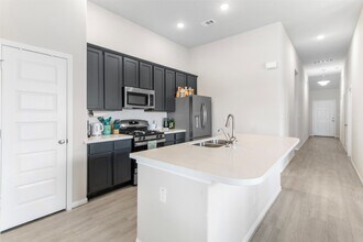 14930 Spg Frst Ln in Mont Belvieu, TX - Building Photo - Building Photo