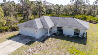 7625 Minardi St in North Port, FL - Building Photo - Building Photo