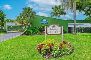 9091 Lime Bay Blvd in Tamarac, FL - Building Photo
