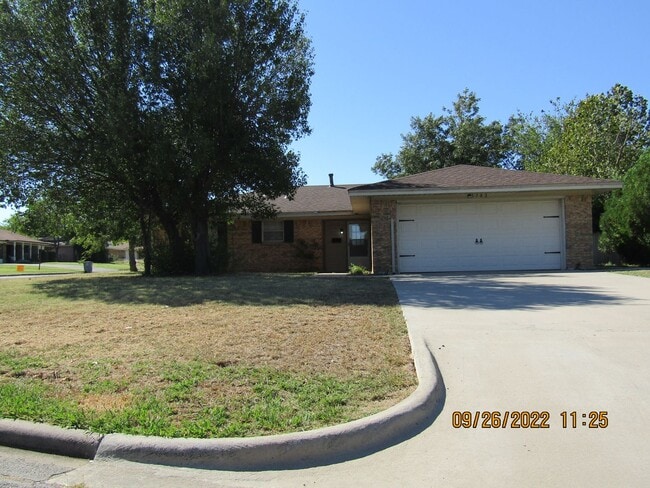 property at 5702 NW Cedarwood Dr