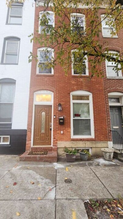 311 N Stricker St in Baltimore, MD - Building Photo