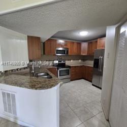 9033 Wiles Rd in Coral Springs, FL - Building Photo - Building Photo