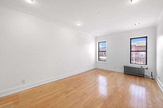 property at 44-14 Newtown Rd