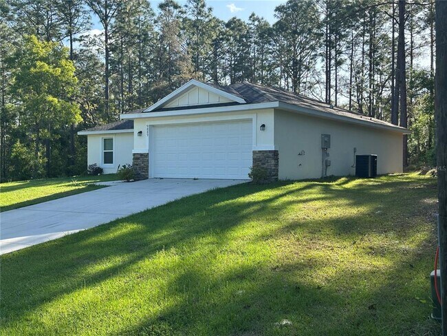 9889 N Langdon Rd in Citrus Springs, FL - Building Photo - Building Photo