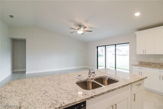 1005 Angelo Ave in Lehigh Acres, FL - Building Photo - Building Photo