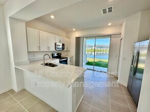 11813 Stonesmith Xing in Palmetto, FL - Building Photo - Building Photo