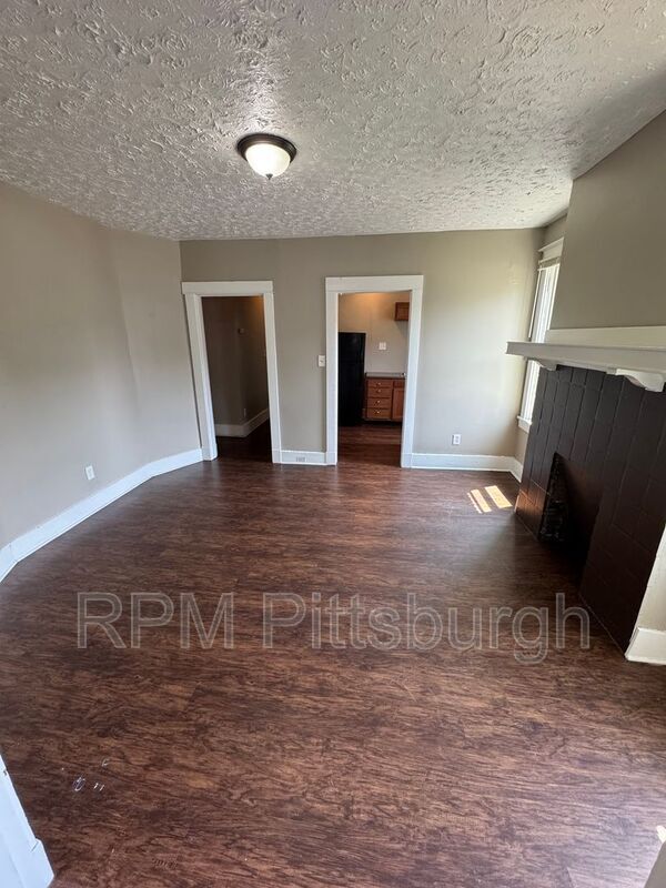 property at 311-313 W Burgess St