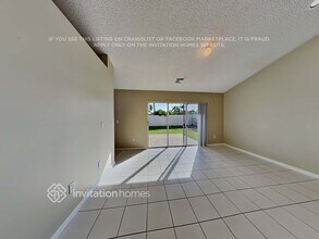 13048 Meadowbreeze Dr in Wellington, FL - Building Photo - Building Photo
