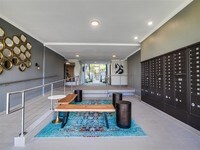 Grab your mail, visit the leasing office, or catch up with your neighbors in the newly redesigned lobby. - Candlewood North Apartments in Los Angeles, California
