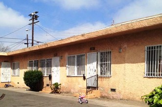 9617-9623 S San Pedro St in Los Angeles, CA - Building Photo - Building Photo