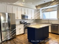 7228 Brittany Park Ave in West Jordan, UT - Foto de edificio - Building Photo