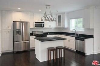 7013 Andasol Ave in Los Angeles, CA - Building Photo - Building Photo