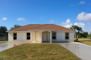 12442 Grouse Ave in Port Charlotte, FL - Building Photo