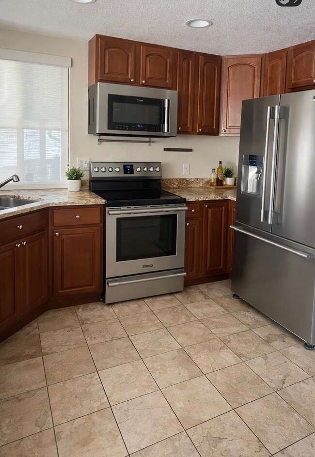 17336 E Kenyon Dr in Aurora, CO - Building Photo - Building Photo