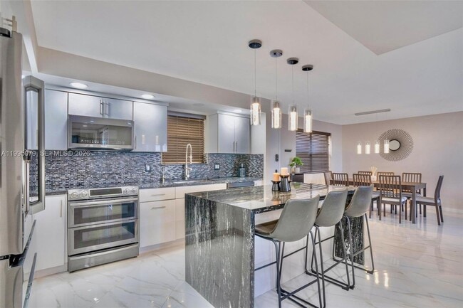 property at 605 Ives Dairy Rd