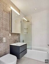 STANTON ST., Unit 5F in New York, NY - Building Photo - Building Photo