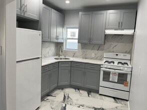 10729 104th St, Unit G in Ozone Park, NY - Building Photo - Building Photo