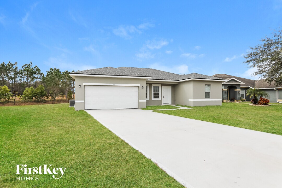 1293 N Platte Ct in Poinciana, FL - Foto de edificio