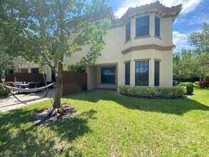 10283 Wellington Parc Dr in Wellington, FL - Building Photo - Building Photo