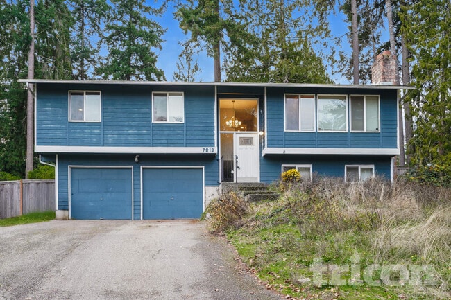 property at 7213 NW Rhododendron Pl