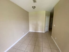 9448 Flowering Cottonwood Rd in Orlando, FL - Building Photo - Building Photo