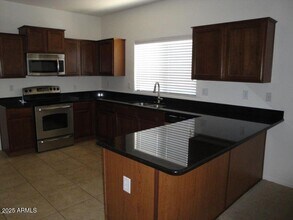 37128 W Mondragone Ln in Maricopa, AZ - Building Photo - Building Photo