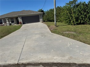 919 Chaplin Ave in Lehigh Acres, FL - Building Photo - Building Photo