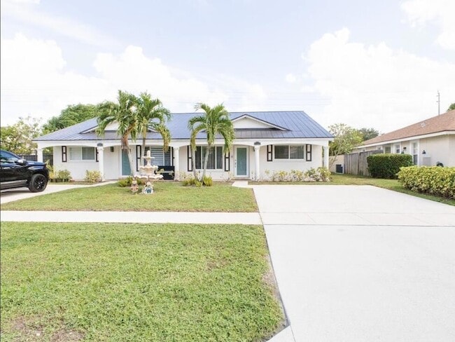 1322 Riverside Cir in Wellington, FL - Building Photo - Building Photo