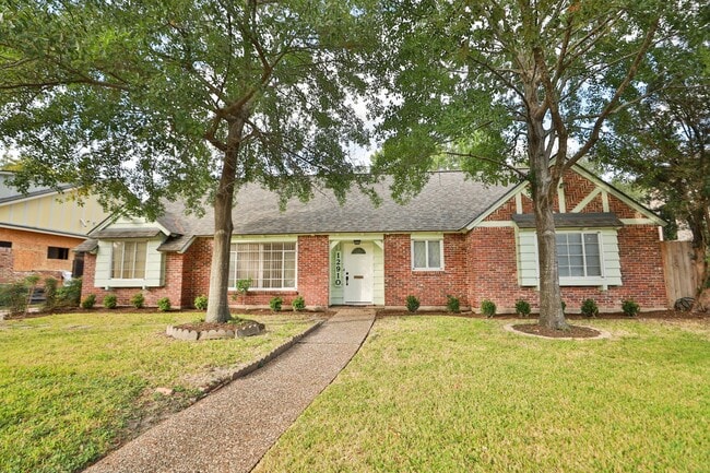 property at 12910 Queensbury Ln