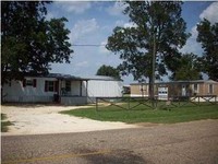 3316 Poarch Rd in Atmore, AL - Foto de edificio - Building Photo