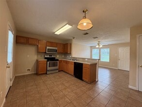 14129 Broken Arrow Dr in Willis, TX - Building Photo - Building Photo